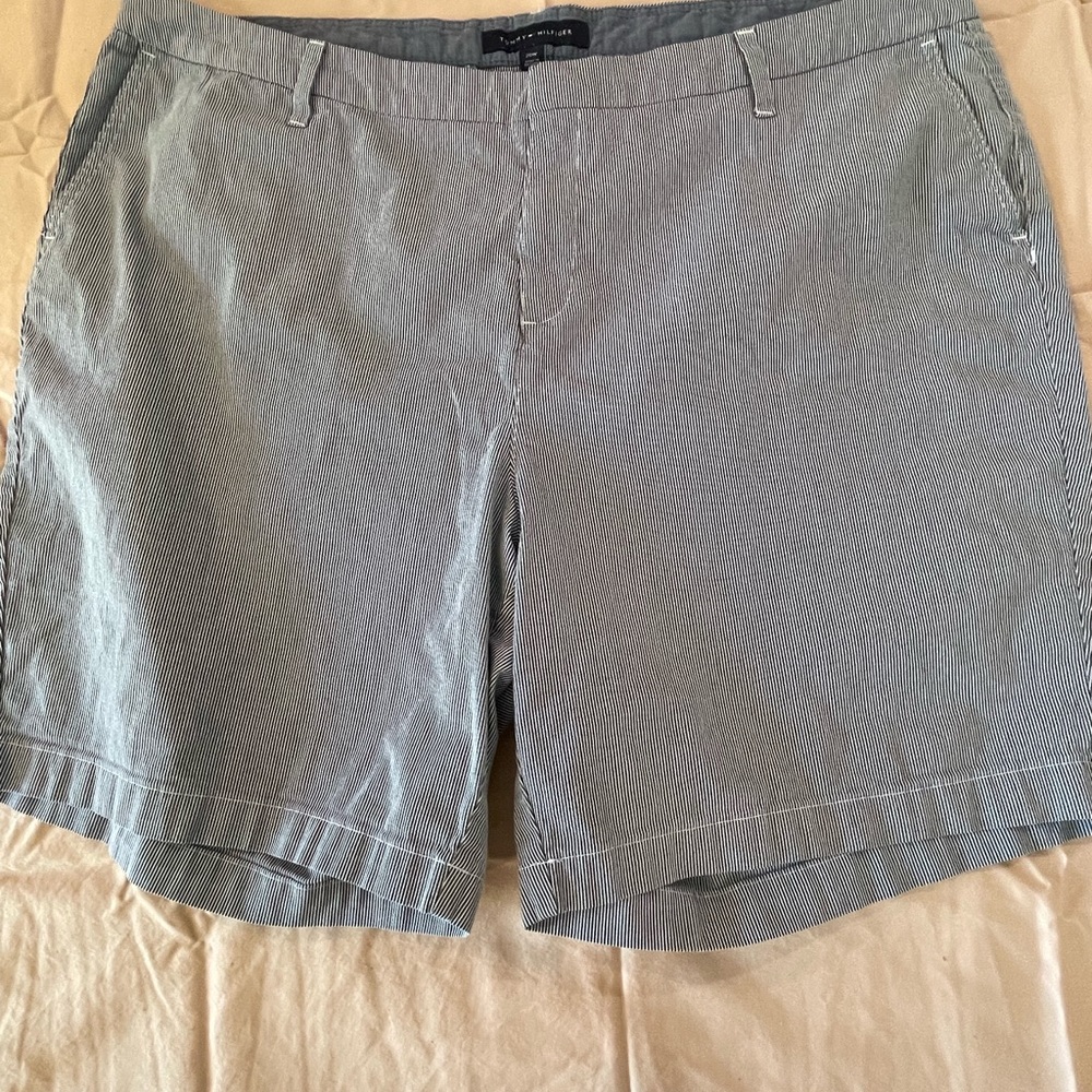 Blue striped Bermuda shorts.  Easy wash and wear. Side and back pockets.